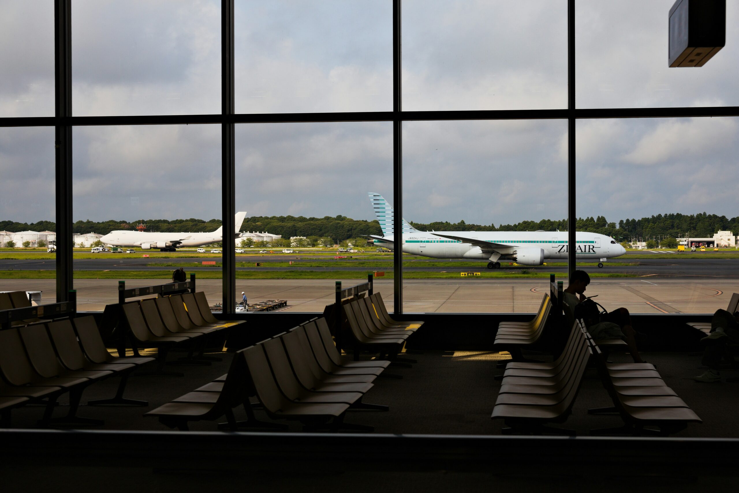 rows of seats with a large window