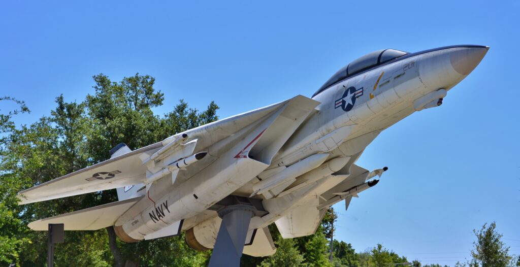 white plane with blue sky