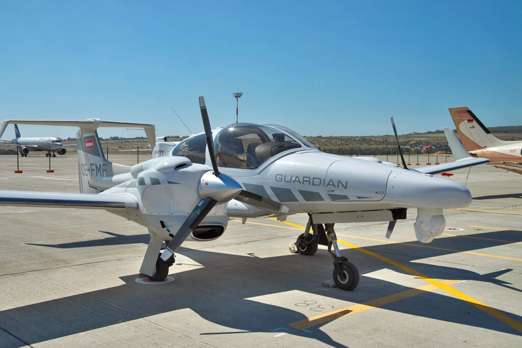 white plane on tarmack